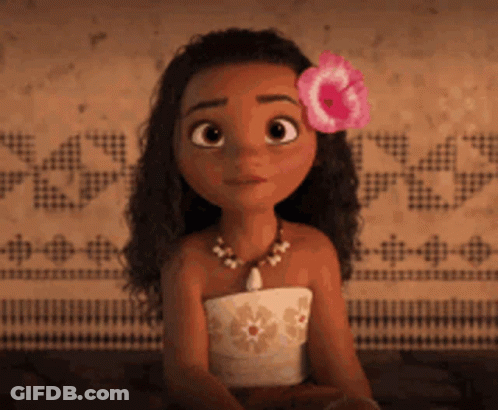 A Cartoon Girl With A Flower In Her Hair Is Sitting Down GIF