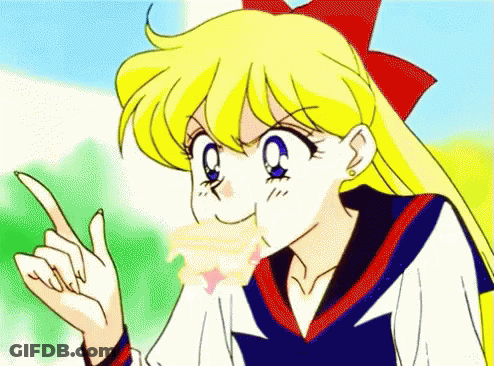 A Cartoon Girl With Blonde Hair And A Red Bow On Her Head Is Pointing Up . GIF