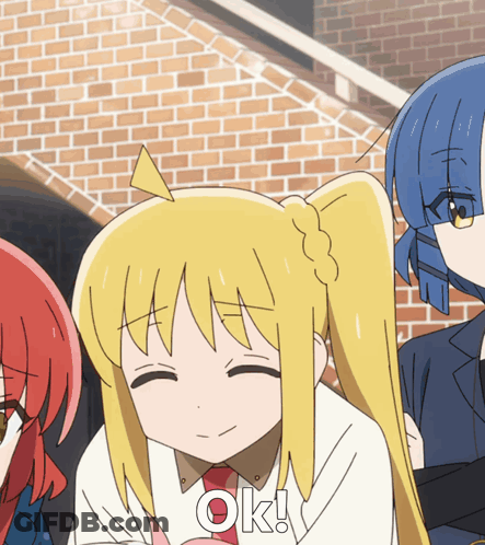 A Cartoon Girl With Blonde Hair Is Smiling With The Word Ok Below Her GIF