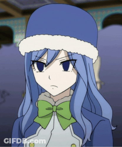 A Cartoon Girl With Blue Hair And A Green Bow GIF