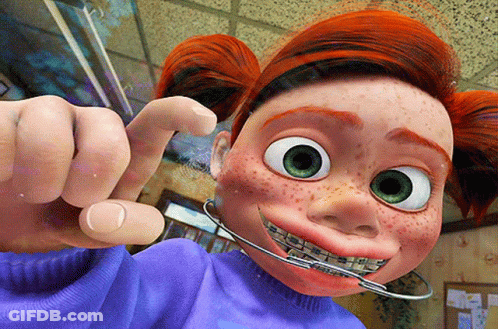 A Cartoon Girl With Braces On Her Teeth Is Making A Funny Face GIF