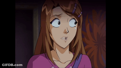 A Cartoon Girl With Brown Hair And A Purple Shirt Making A Funny Face GIF