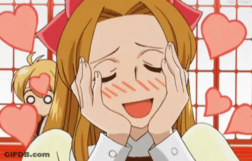 A Cartoon Girl With Her Hands On Her Face Is Surrounded By Hearts . GIF