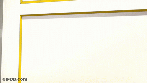 A Cartoon Girl With Pink Hair And Blue Eyes Is Making A Funny Face GIF