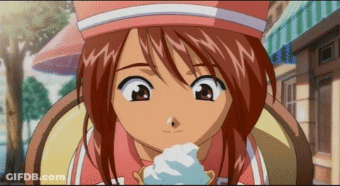 A Cartoon Girl With Red Hair Is Eating Ice Cream GIF