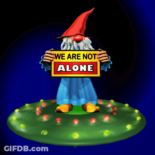 A Cartoon Gnome Holding A Sign That Says We Are Not Alone GIF