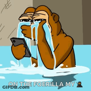 A Cartoon Gorilla Is Crying While Holding A Cell Phone In The Water . GIF