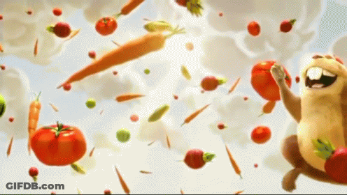 A Cartoon Hamster Is Surrounded By Vegetables Including Carrots Tomatoes And Peppers GIF