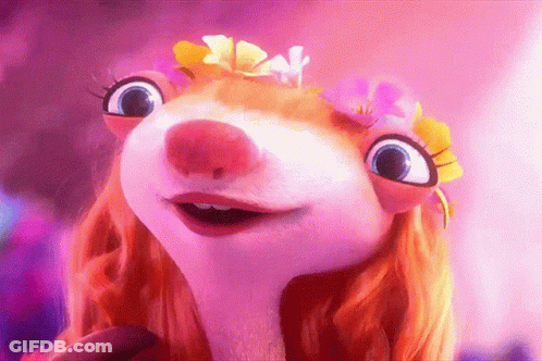 A Cartoon Hamster With Red Hair And Flowers On Her Head GIF