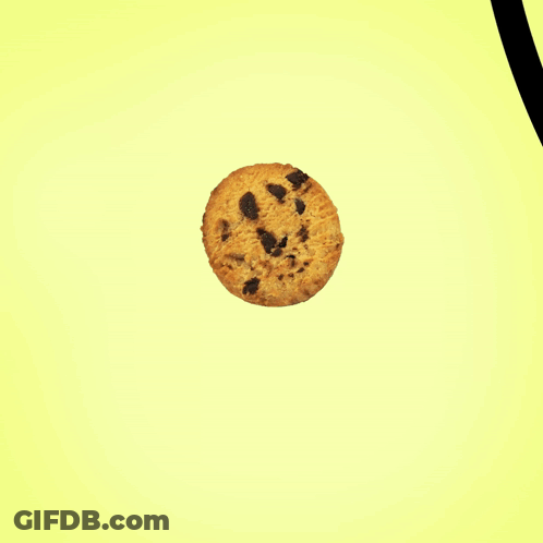 A Cartoon Hand Holding A Chocolate Chip Cookie GIF