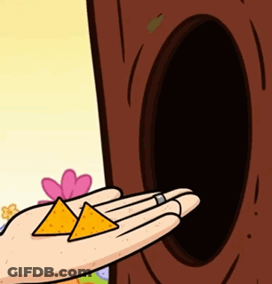 A Cartoon Hand Is Holding A Pair Of Nachos In Front Of A Tree GIF