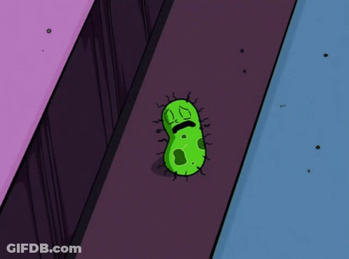 A Cartoon Illustration Of A Green Bacteria With A Sad Face GIF