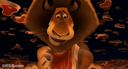 A Cartoon Lion Eating A Piece Of Meat With His Tongue Hanging Out GIF