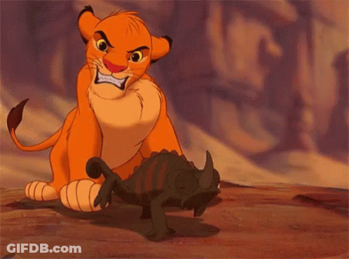 A Cartoon Lion Is Standing Next To A Lizard With Its Mouth Wide Open . GIF