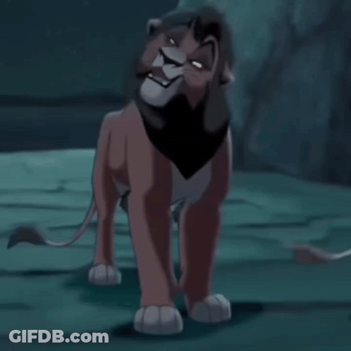 A Cartoon Lion With A Black Scarf Around Its Neck Is Standing In A Dark Room GIF