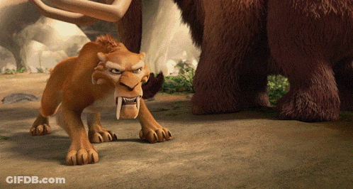 A Cartoon Lion With Sharp Teeth Is Standing Next To A Brown Bear GIF