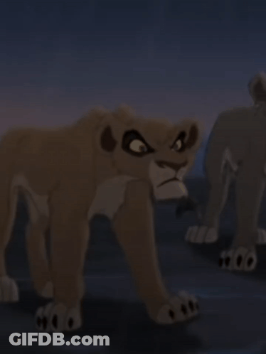 A Cartoon Lioness Is Standing In The Dark With A Serious Look On Her Face GIF