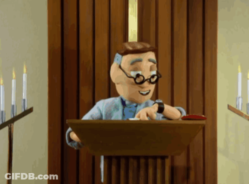A Cartoon Man Is Giving A Speech At A Podium With Candles In The Background GIF