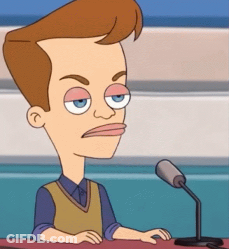 A Cartoon Man Is Sitting At A Podium With A Microphone GIF