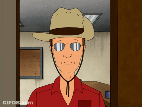 A Cartoon Man Wearing A Cowboy Hat And Sunglasses Stands In A Doorway GIF