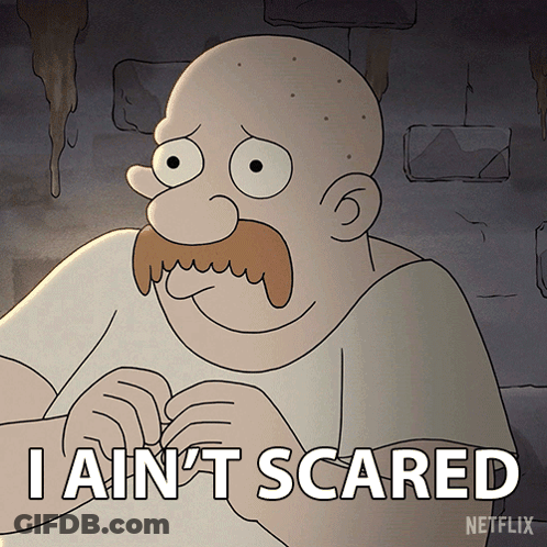 A Cartoon Man With A Mustache Says " I Ain T Scared " GIF