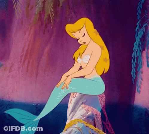 A Cartoon Mermaid Is Sitting On A Rock In The Water GIF