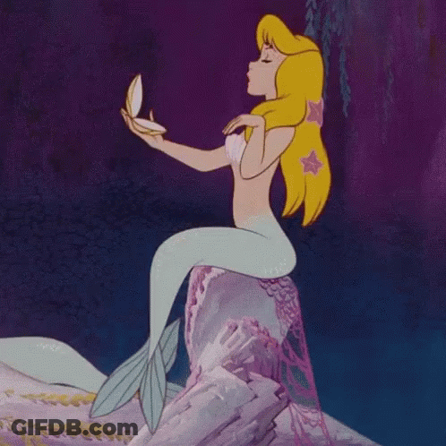 A Cartoon Mermaid Is Sitting On A Rock Looking At Herself In A Mirror GIF