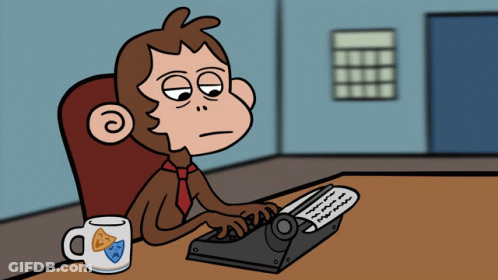 A Cartoon Monkey Is Typing On A Typewriter GIF