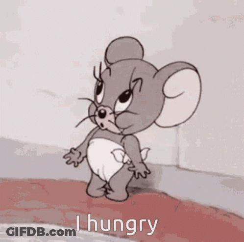 A Cartoon Mouse In A Diaper Is Yawning While Holding A Spoon . GIF