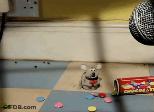 A Cartoon Mouse Is Eating Candy Next To A Can Of Chocola Chips GIF