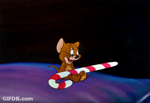 A Cartoon Mouse Is Holding A Candy Cane In His Paws GIF