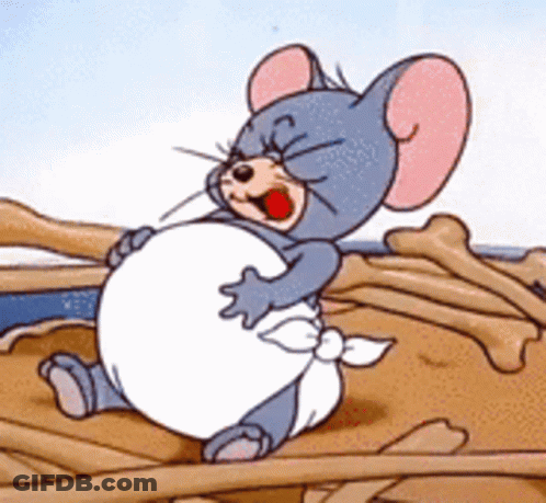 A Cartoon Mouse Is Sitting On A Pile Of Bones And Holding His Belly GIF
