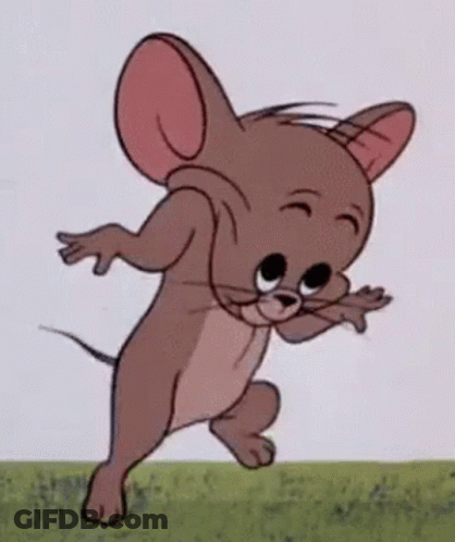 A Cartoon Mouse Is Standing In The Grass With His Arms Outstretched And Smiling . GIF