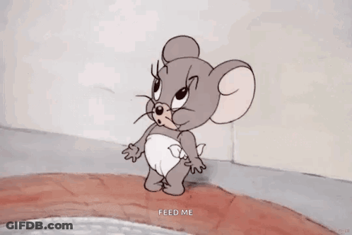 A Cartoon Mouse Is Wearing A Diaper And Saying Feed Me GIF