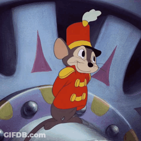 A Cartoon Mouse Wearing A Red And Yellow Uniform And A Hat GIF