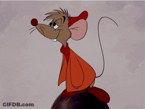 A Cartoon Mouse Wearing A Red Coat And Red Hat GIF