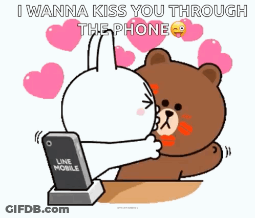 A Cartoon Of A Bear And A Rabbit Kissing Each Other While Looking At A Cell Phone . GIF