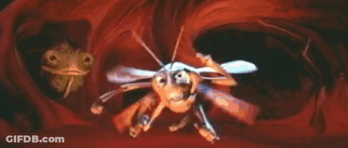 A Cartoon Of A Bee Eating Another Bee In A Red Cave . GIF