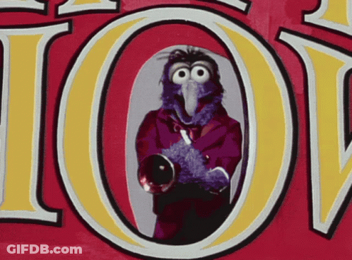 A Cartoon Of A Bird Holding A Trumpet In Front Of A Sign That Says Ioy GIF