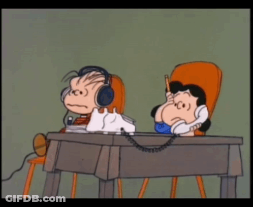 A Cartoon Of A Boy And A Girl Sitting At A Desk Talking On A Phone GIF