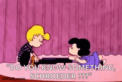 A Cartoon Of A Boy And A Girl Sitting Next To Each Other In Front Of A Piano . GIF