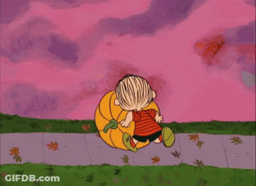 A Cartoon Of A Boy Carrying A Pumpkin On A Sidewalk GIF