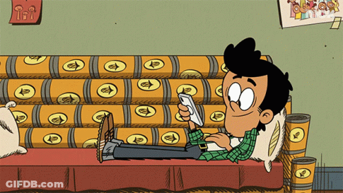 A Cartoon Of A Boy Laying On A Couch Looking At His Phone GIF