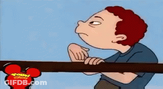 A Cartoon Of A Boy Pointing At A Disney Mouse Head GIF
