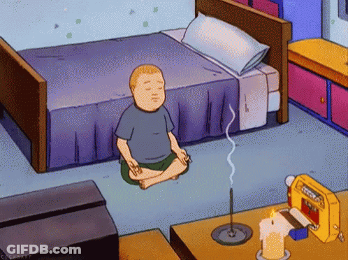 A Cartoon Of A Boy Sitting In A Lotus Position In Front Of A Bed GIF