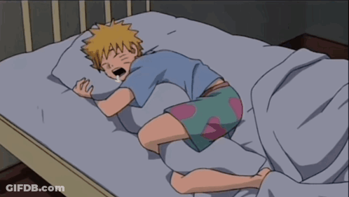 A Cartoon Of A Boy Sleeping On A Bed With His Mouth Open GIF