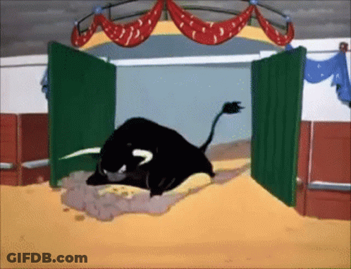 A Cartoon Of A Bull Laying On The Ground In A Ring GIF