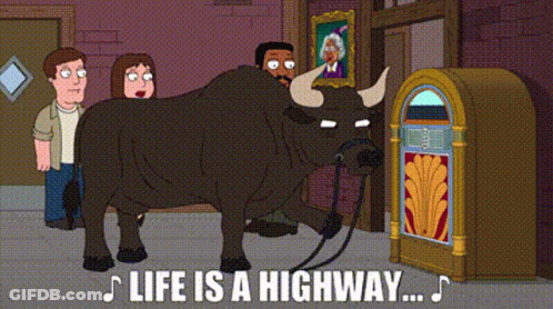 A Cartoon Of A Bull Standing Next To A Jukebox With The Words Life Is A Highway Below It GIF