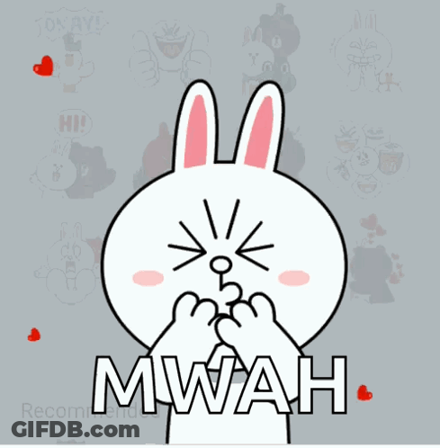 A Cartoon Of A Bunny Holding A Heart With The Word Mwah Written On It GIF