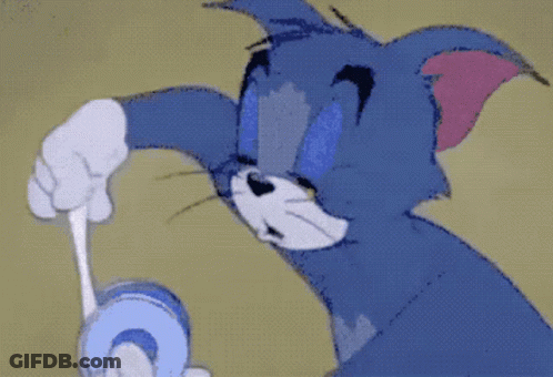 A Cartoon Of A Cat Holding A Stick With A Burst Of Light Coming Out Of It GIF